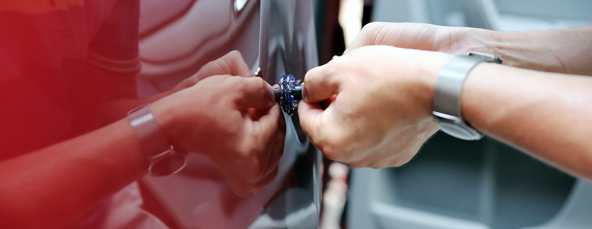 Changing oil in a car.